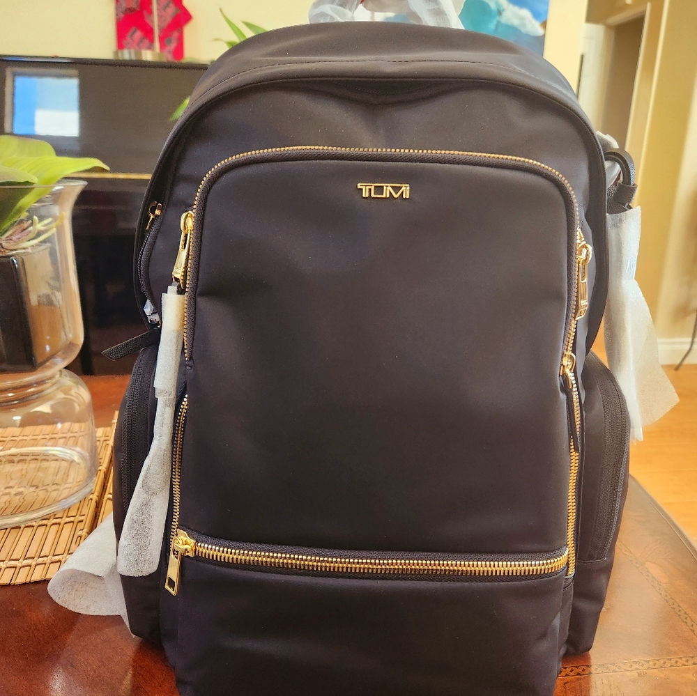 NEW TUMI BLACK BACK PACK,